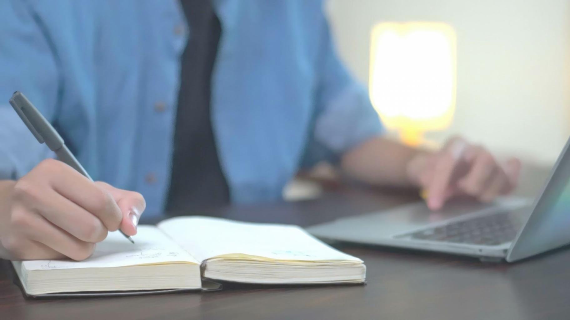 Financial analyst reviewing DCF model spreadsheet with multiple scenarios displayed on computer screen
