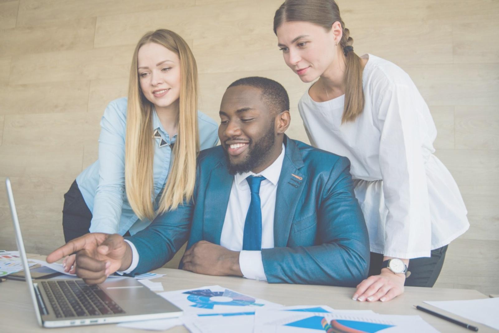 Professional learning environment with students collaborating on financial analysis projects